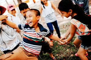 children playing and laughing